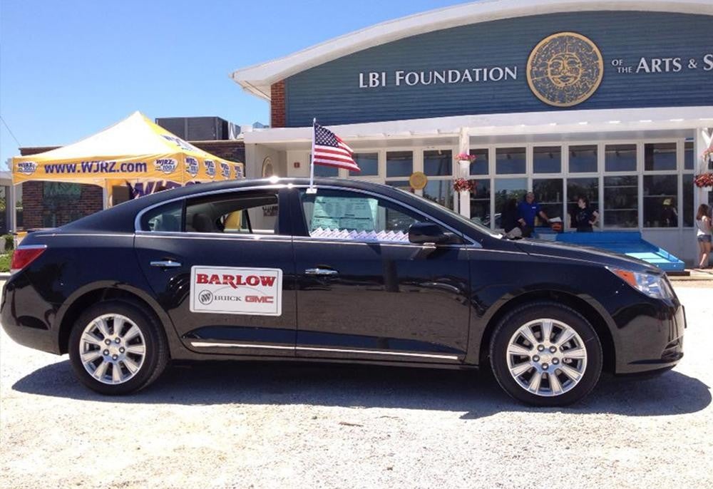 black car with barlow logo