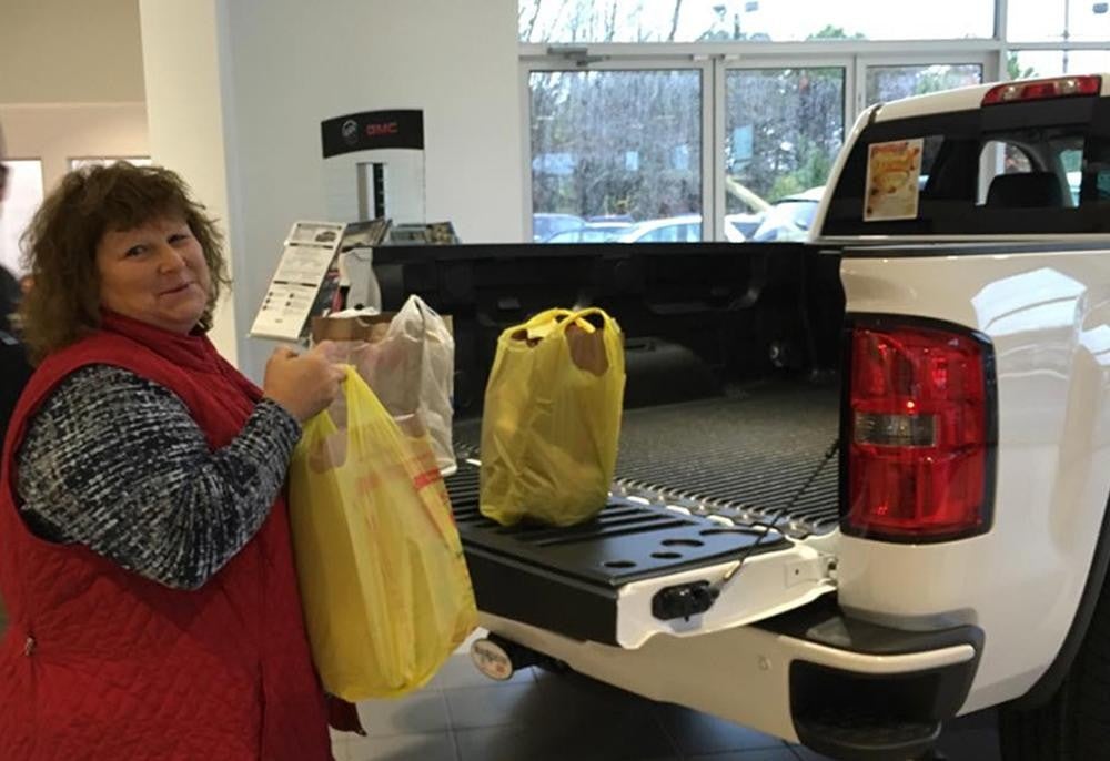 woman holding grocery bags